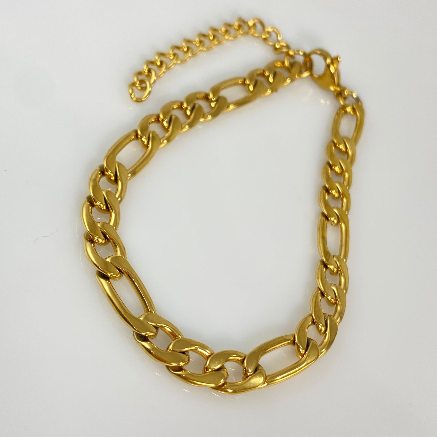 Bracelet à maillons Figaro en or de 7 mm de large et 1/4" en acier inoxydable 316L
