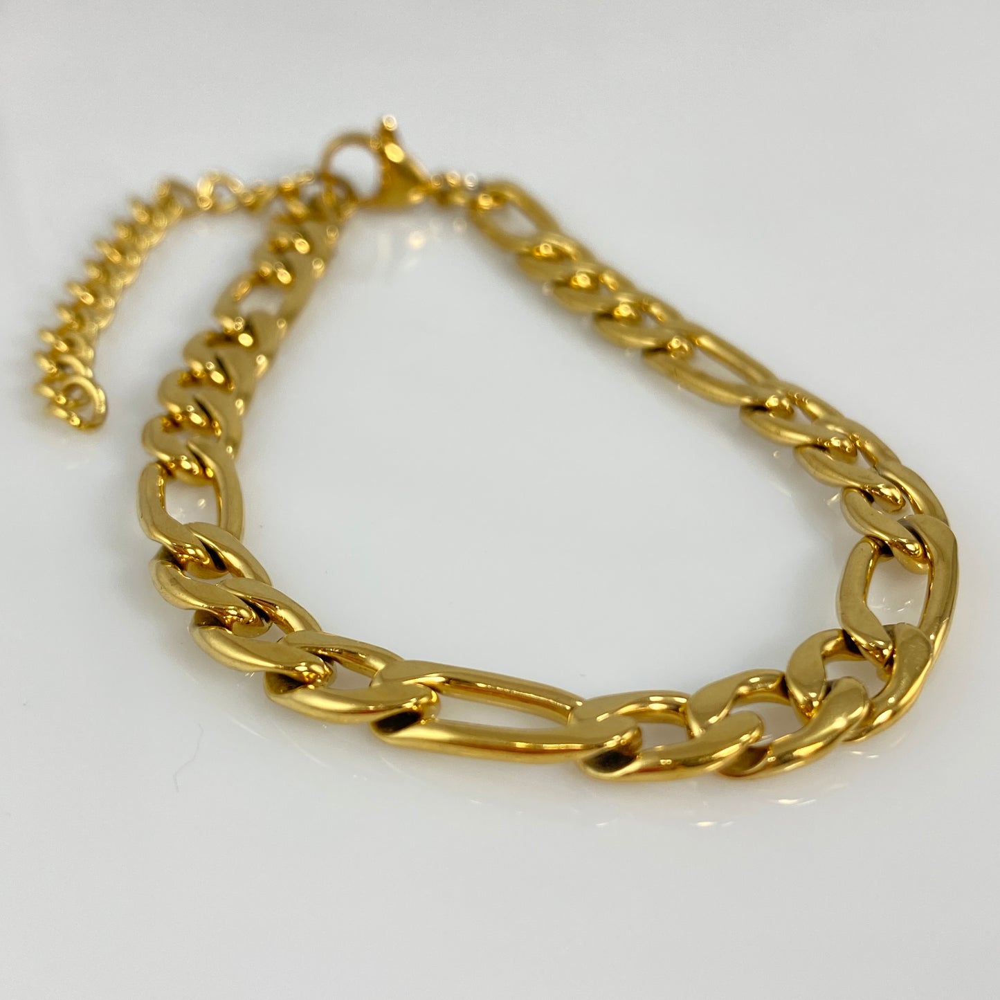 Bracelet à maillons Figaro en or de 7 mm de large et 1/4" en acier inoxydable 316L