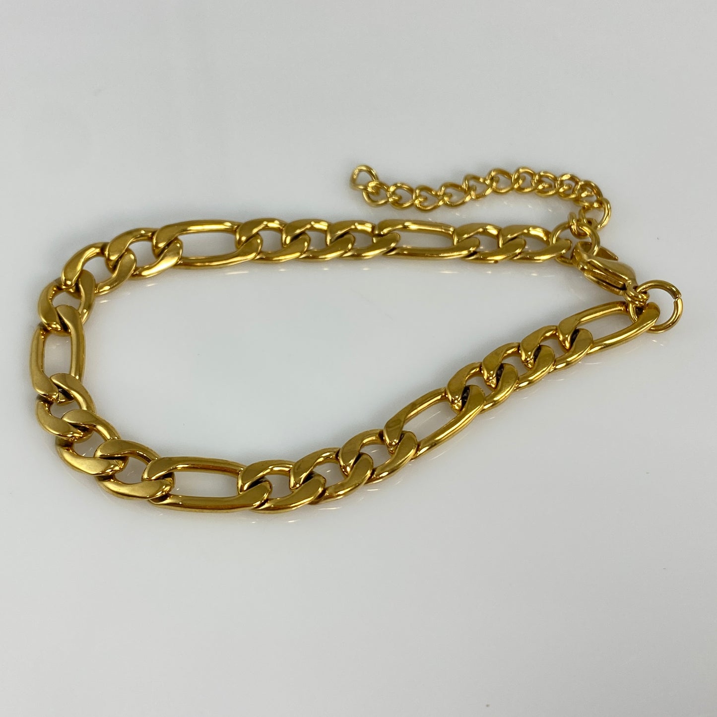 Bracelet à maillons Figaro en or de 7 mm de large et 1/4" en acier inoxydable 316L