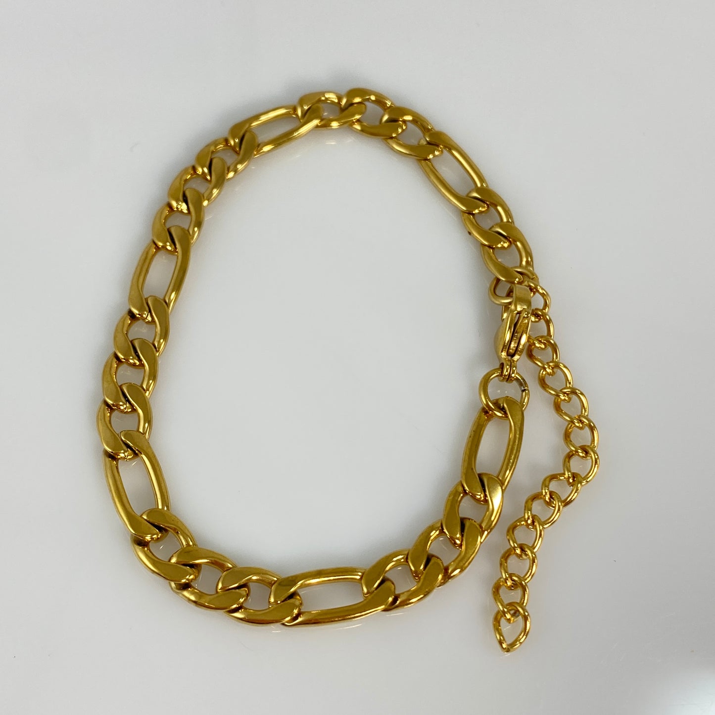 Bracelet à maillons Figaro en or de 7 mm de large et 1/4" en acier inoxydable 316L