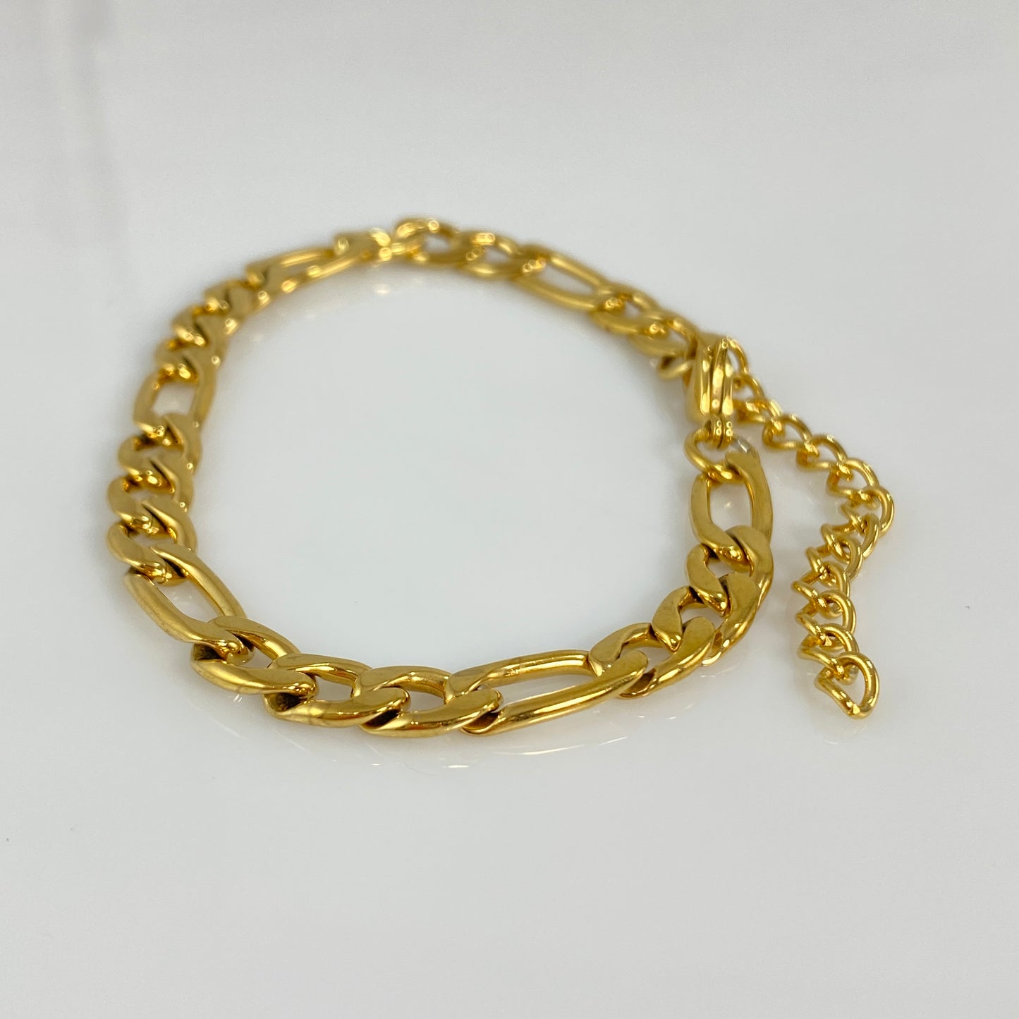 Bracelet à maillons Figaro en or de 7 mm de large et 1/4" en acier inoxydable 316L