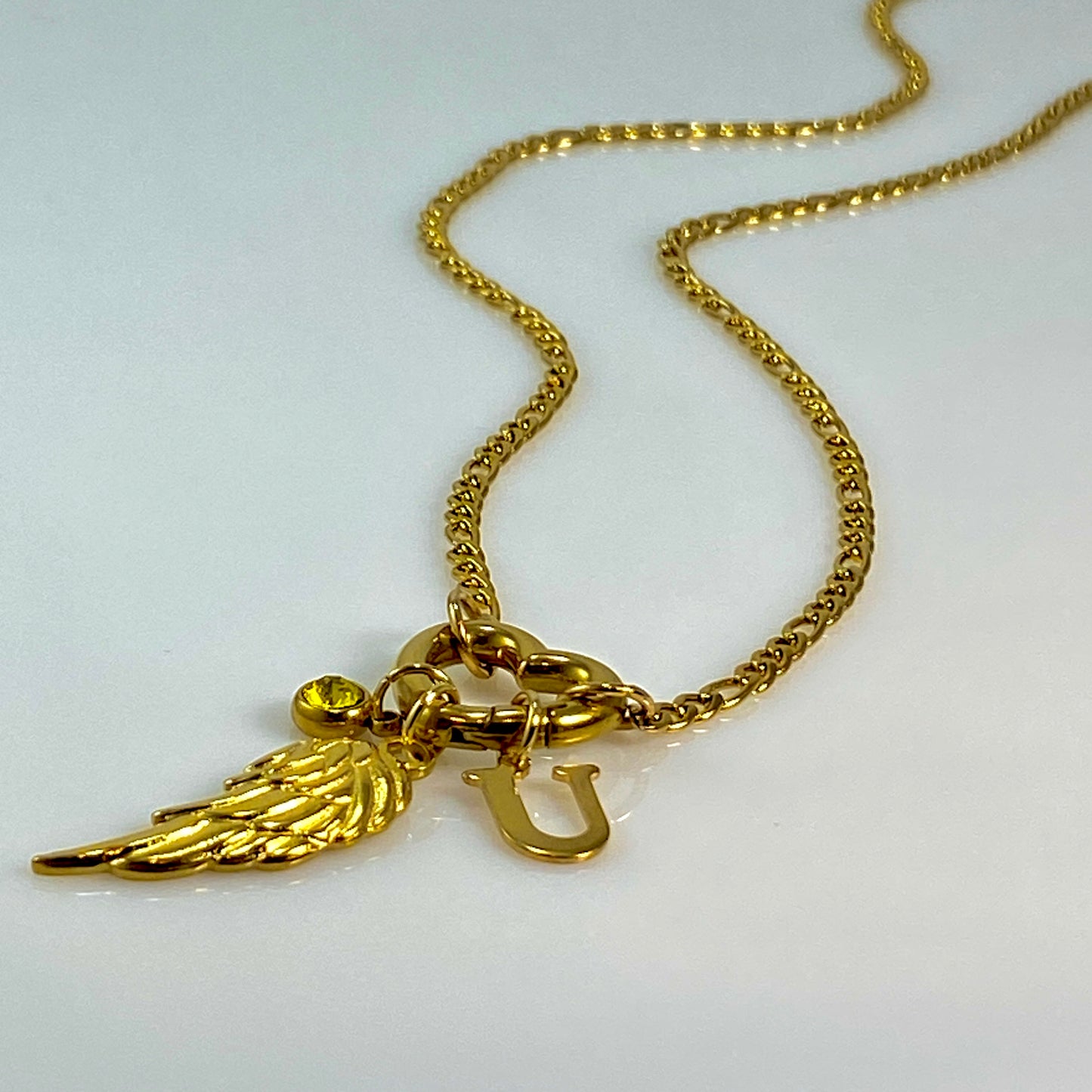 Gold Wing, Letter - Initial & Birthstone on a Heart Carabiner & Figaro Chain Necklace