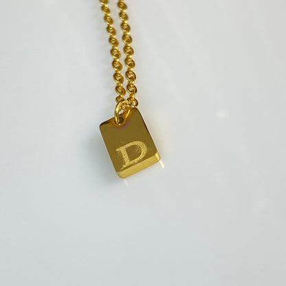 Collier en acier inoxydable doré 18 carats avec petite lettre initiale