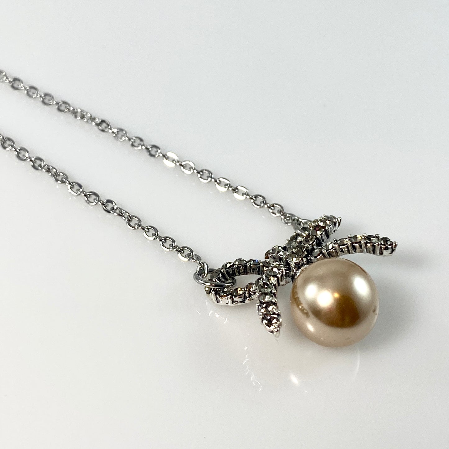 Glass Pearl Bowtie Necklace