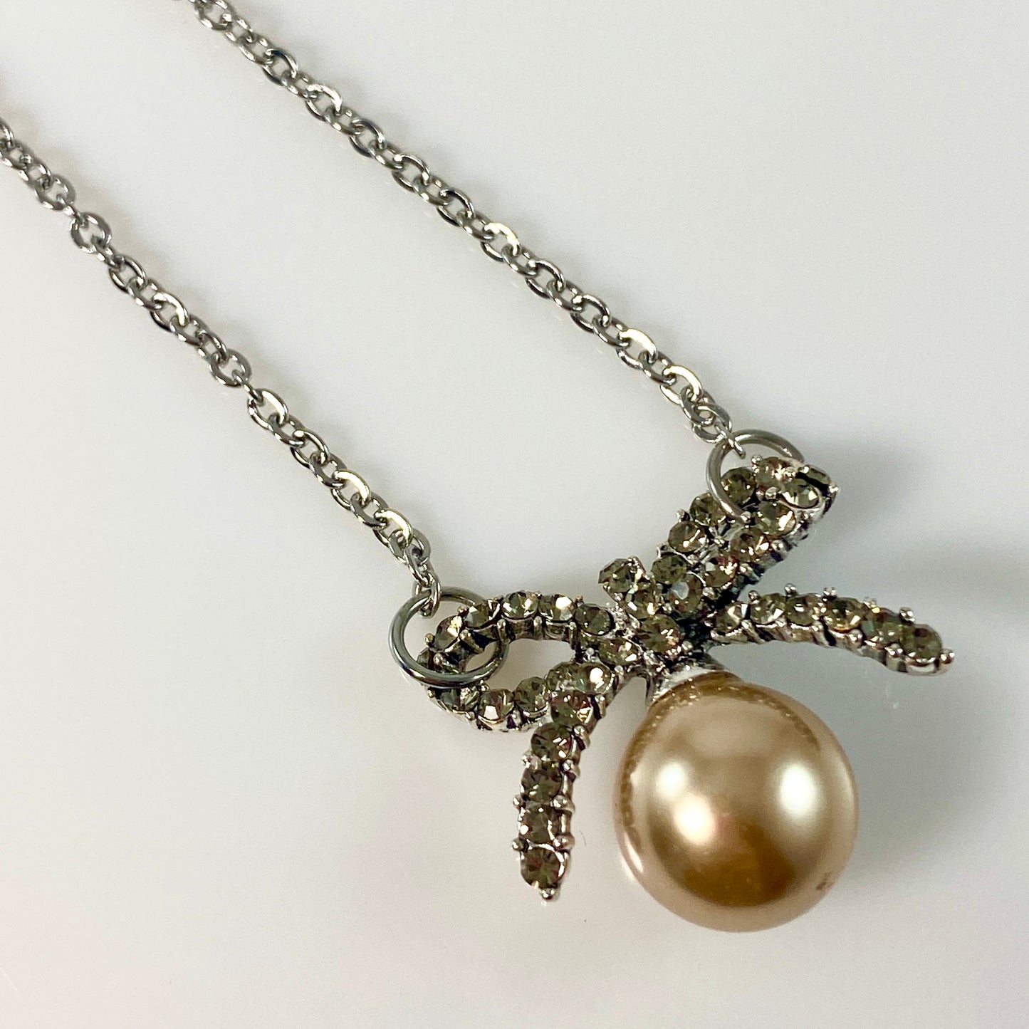 Glass Pearl Bowtie Necklace