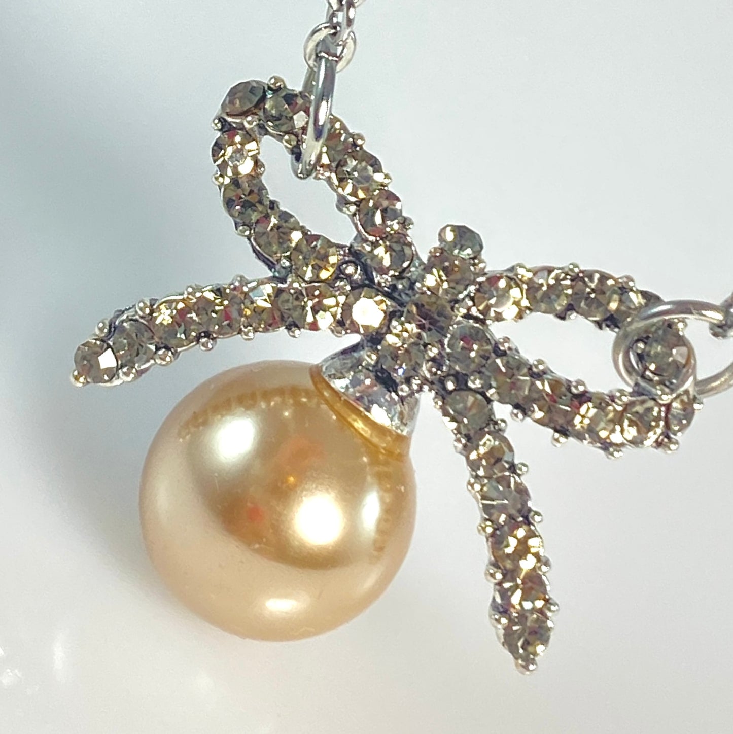 Glass Pearl Bowtie Necklace