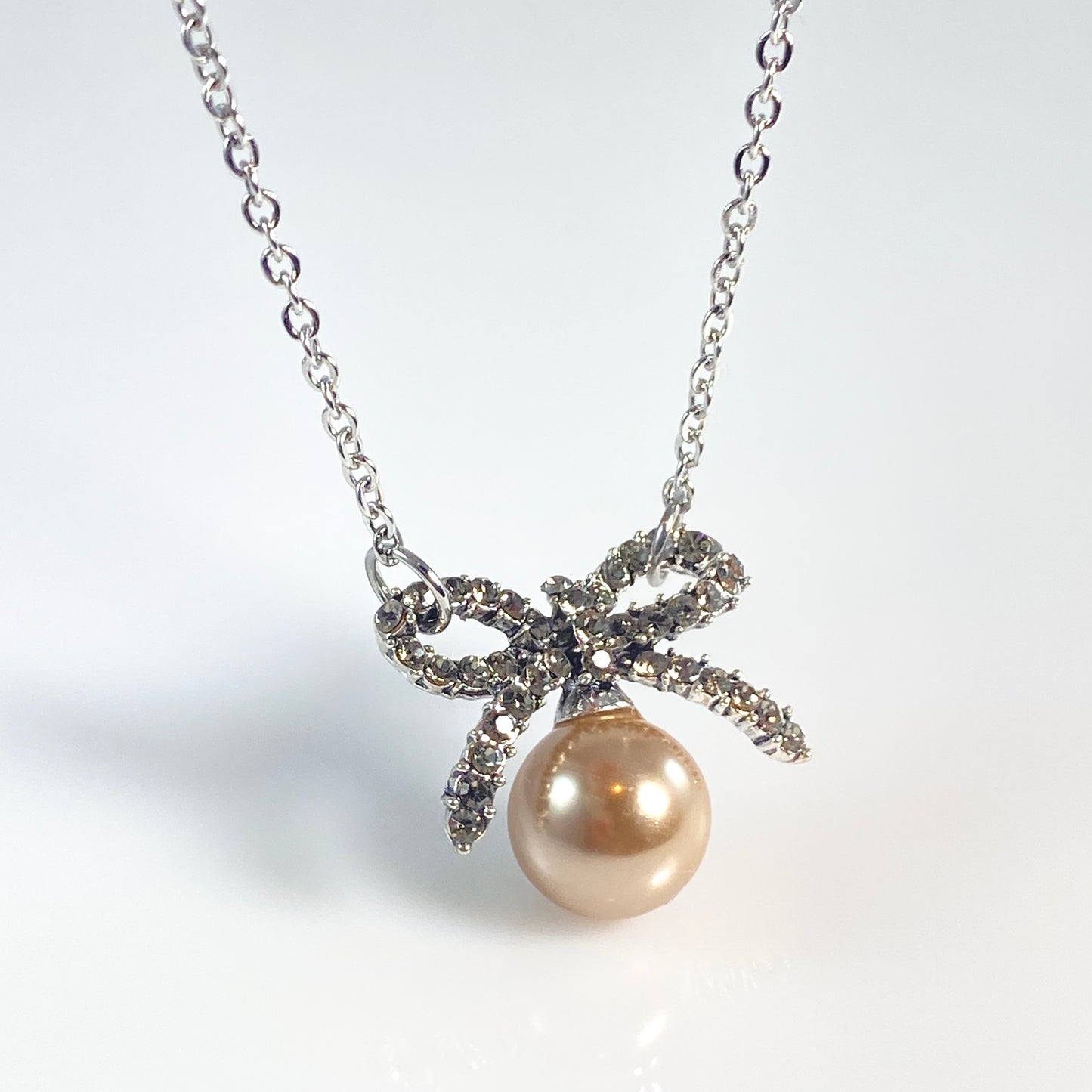 Glass Pearl Bowtie Necklace